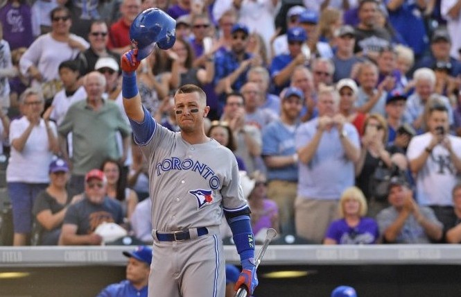 Troy Tulowitzki gets a very Coors Field welcome for his Colorado